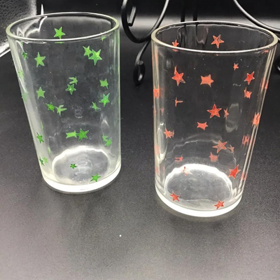 Swanky Swigs Juice Glasses Green Red Stars