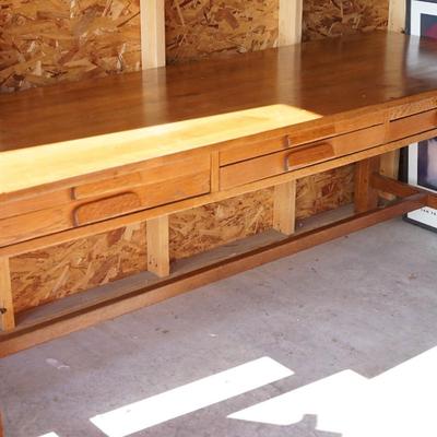 EARLY 20TH CENTURY SCHOOL LIBRARY OR WORK  DESK W/SIX DRAWERS SOLID OAK, OAK DRAWER PULLS.