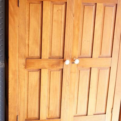 VINTAGE LIGHT COLORED CHERRY PANELLED CABINET W/LOWER DRAWER /TWO SHELVES