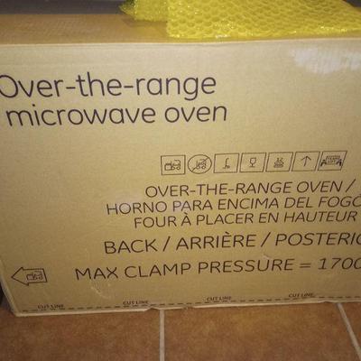 New over the range microwave stainless steel. Still in box!! 1,000watts 