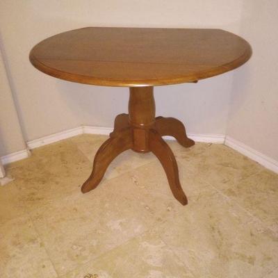 Dinnette table. Both sides fold down