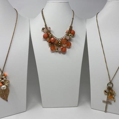 The Gold Tone with Pink and Peach Accent Necklace Lot
