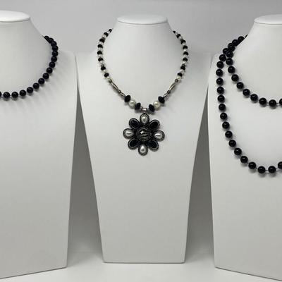 The Black and White Necklace Lot