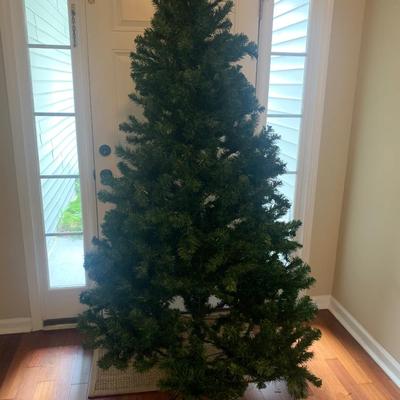 6â€™ Christmas tree, 3 pieces and stand @3â€™ diameter- can be adjusted more than shown
