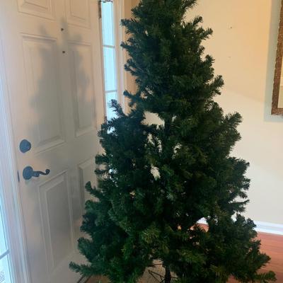 6â€™ Christmas tree, 3 pieces and stand @3â€™ diameter- can be adjusted more than shown
