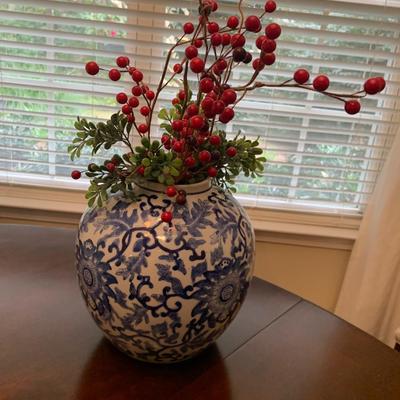Blue & white vase- shown with red berries
