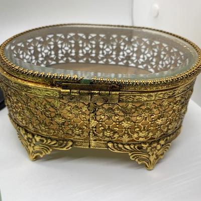 Brass Ormolu jewelry box, beveled glass, footed, 2 green glass pieces, 2 metal candle holders