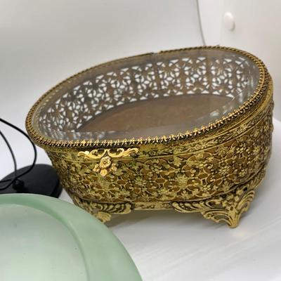 Brass Ormolu jewelry box, beveled glass, footed, 2 green glass pieces, 2 metal candle holders