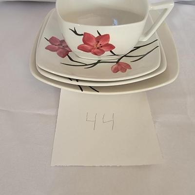 Painted teacup and saucers