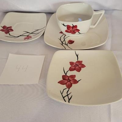 Painted teacup and saucers