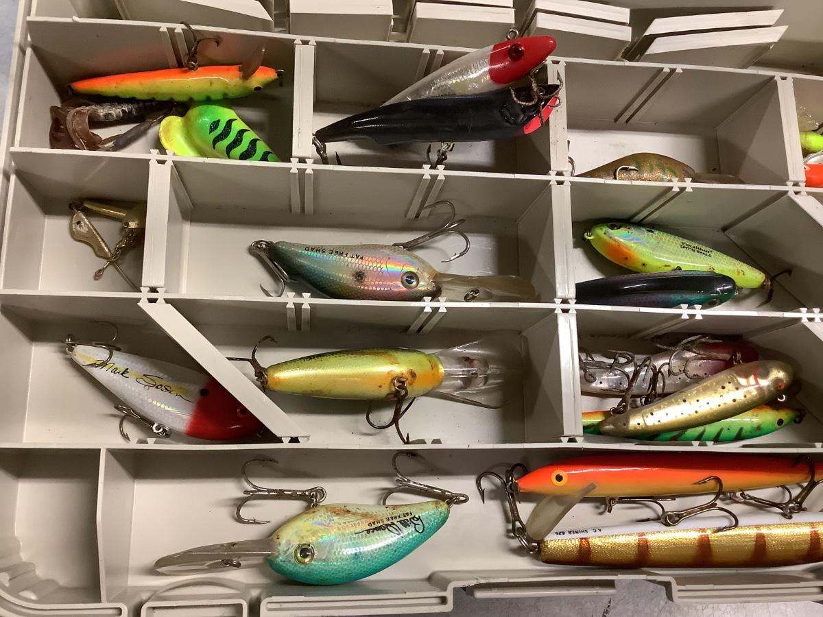 Plano blue tackle box, see through top, lots of lures! | EstateSales.org