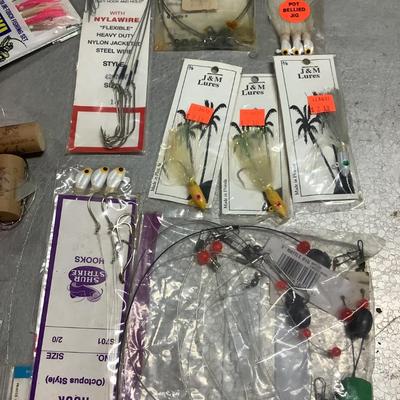 Saltwater leaders, lures, new in package squid bait, etc