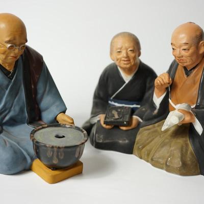 VINTAGE JAPANESE HAKATA URSAKI DOLLS. ELDERLY IN SCROLL WRITING