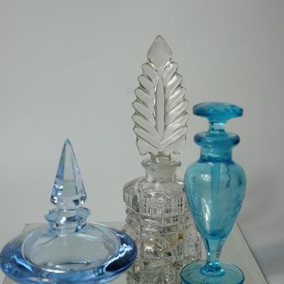 VINTAGE PERFUME BOTTLE IN BLUE AND ONE CLEAR