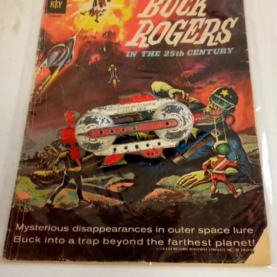 LOT 97  BUCK ROGERS COMIC BOOK AND TOOTSIE TOY SPACESHIP