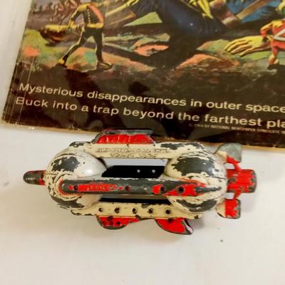 LOT 97  BUCK ROGERS COMIC BOOK AND TOOTSIE TOY SPACESHIP