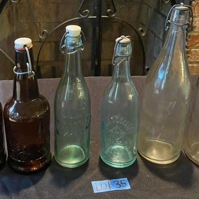 Lot of (6) vintage colorful bottles w/ stoppers and lids 