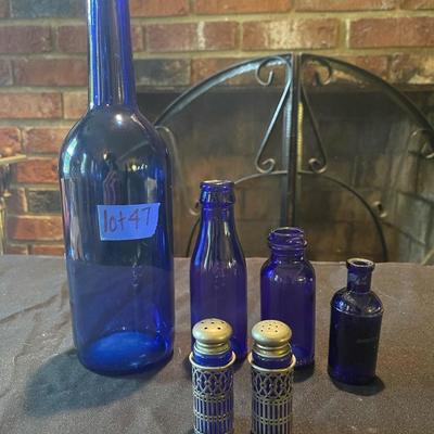 pair of (4) vintage glass bottles and pair of salt and pepper shakers