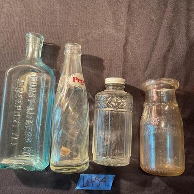 Lot of (4) vintage glass bottles