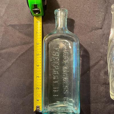 Lot of (4) vintage glass bottles