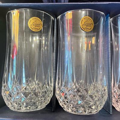 Set of (4) brand new in the box Longchamp crystal glasses