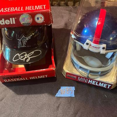 Lot of (2) collectible autographed MLB/NFL Riddel helmets