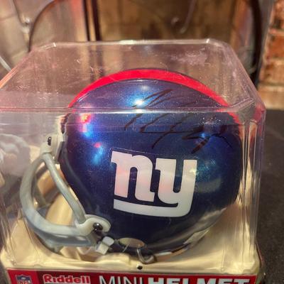 Lot of (2) collectible autographed MLB/NFL Riddel helmets