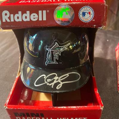 Lot of (2) collectible autographed MLB/NFL Riddel helmets