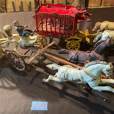 (2) sets of vintage cast iron toy carriages