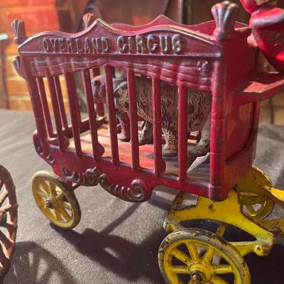 (2) sets of vintage cast iron toy carriages