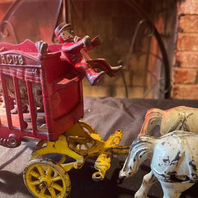 (2) sets of vintage cast iron toy carriages