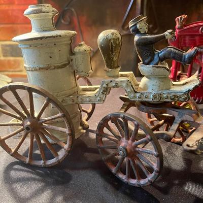 (2) sets of vintage cast iron toy carriages