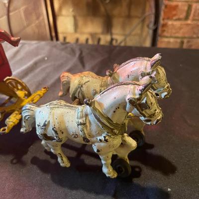 (2) sets of vintage cast iron toy carriages