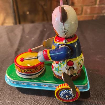 Antique tin panda and drum toy