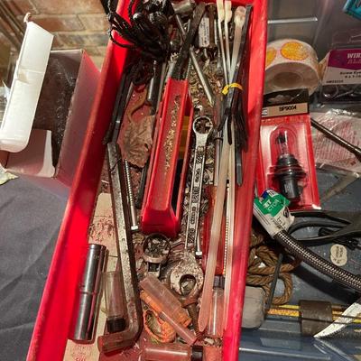 Plastic container, plastic tool carrier, antique misc. knobs, oil can, wrenches, pliers, locks, laserlevel pro, hole puncher, bag of...