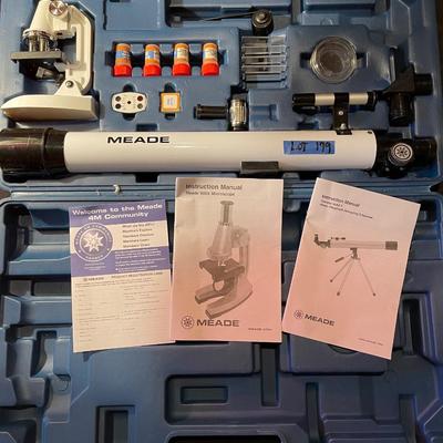Meade 900x Microscope and 40mm Altazimuth retracting telescope.