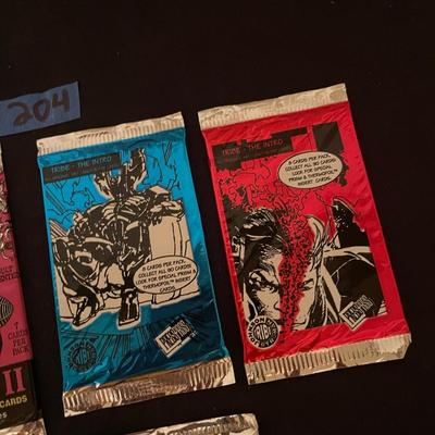 (2) Olivia comic cards, (20 Tribe-The Intro, (2) The silver surfer.