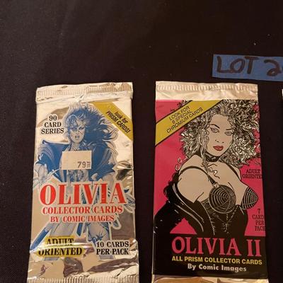 (2) Olivia comic cards, (20 Tribe-The Intro, (2) The silver surfer.