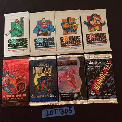 (4) DC cosmic cards inaugural edition, (4) Skybox DC comic cards.
