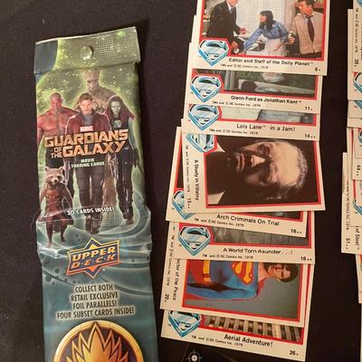 Marvel Guardians of the Galaxy, (2) Lois & Clark The Adv. Of Superman, (1) Suicide Squad dog tags, (1) Marvel hubsnaps, TM's...