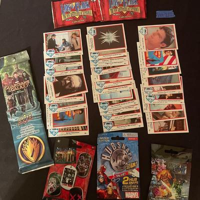 Marvel Guardians of the Galaxy, (2) Lois & Clark The Adv. Of Superman, (1) Suicide Squad dog tags, (1) Marvel hubsnaps, TM's...
