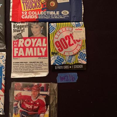 (1) 1991 inaugural edition corvette set, (1) Skybox home improvement, 93-94 caps team set, The Royal family, (1) classic monster trucks,...