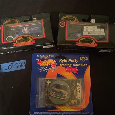 (2) diecast golden years of trucking history trucks, (1) Hot Wheels Kyle Petty