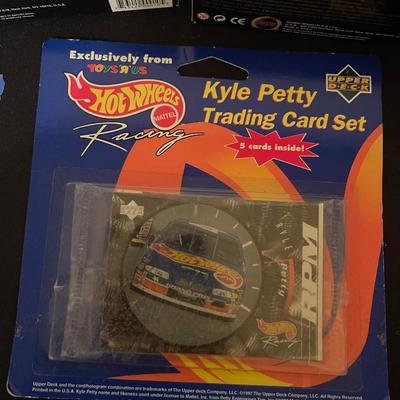 (2) diecast golden years of trucking history trucks, (1) Hot Wheels Kyle Petty