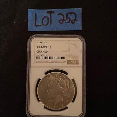 1928 NGC Au details Peace Dollar