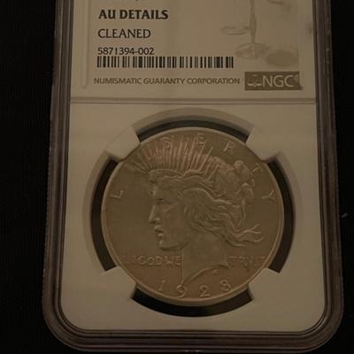 1928 NGC Au details Peace Dollar