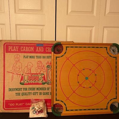 Antique Carom and Crokinole "100 play board" by Merdel includes sticks, intrustuctions, box, board and extra parts.