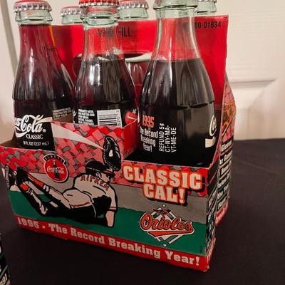 (3) sets of vintage coke bottles for the orioles 