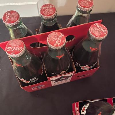 (3) sets of vintage coke bottles for the orioles 