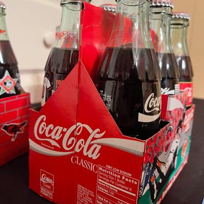 (3) sets of vintage coke bottles for the orioles 